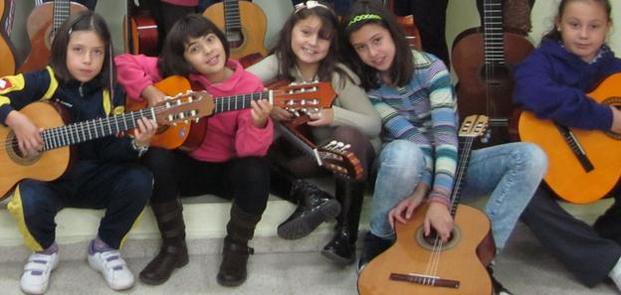 Lepeley Foundation girls with guitars